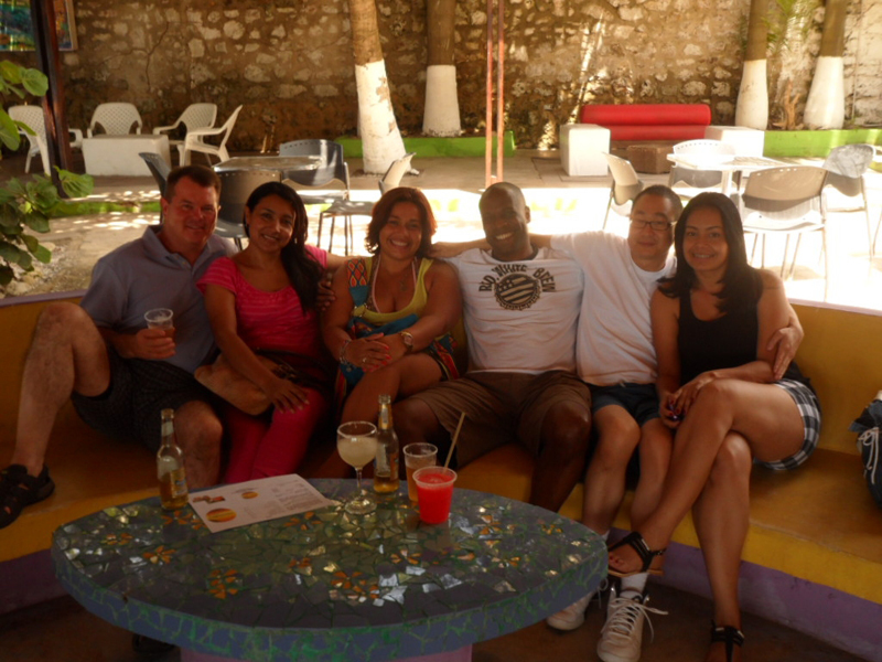 A photo of three Honduran women with foreign men